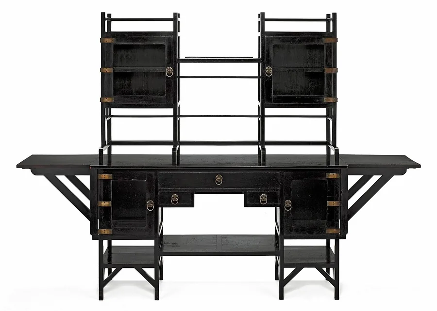 An ebonised sideboard with open shelves, glazed cupboards and fold-out side flaps