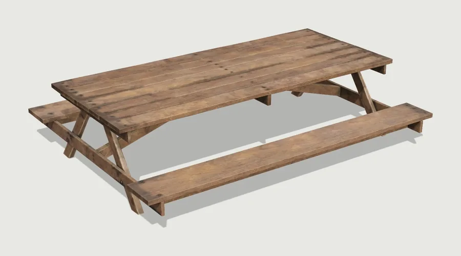A weathered timber picnic table with two separate benches